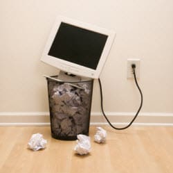 computer in trash can