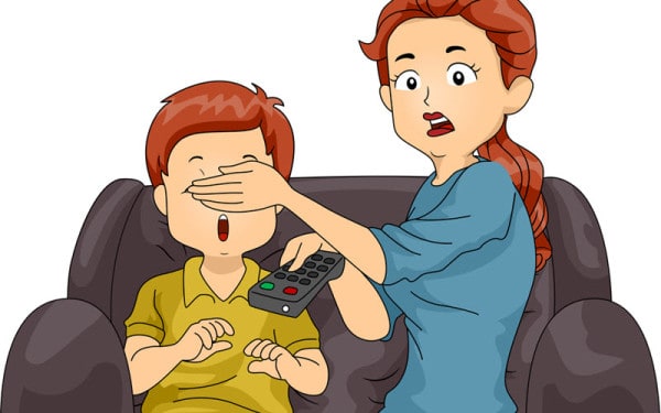 Mom covering son's eyes