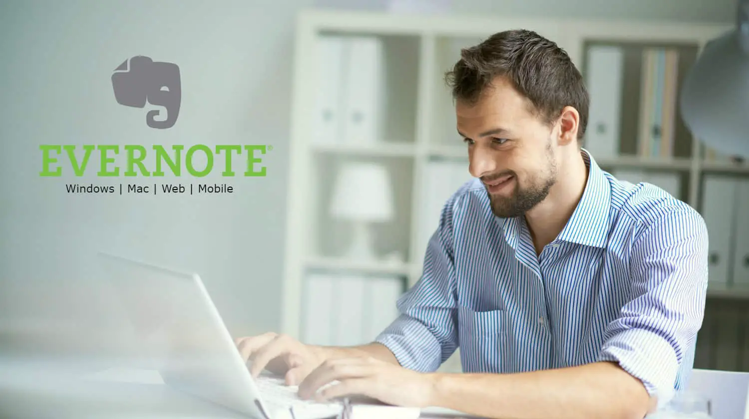 Handsome businessman working with laptop in office | Evernote Review | Everything You Need To Know | Evernote tutorial | mobile device | Featured