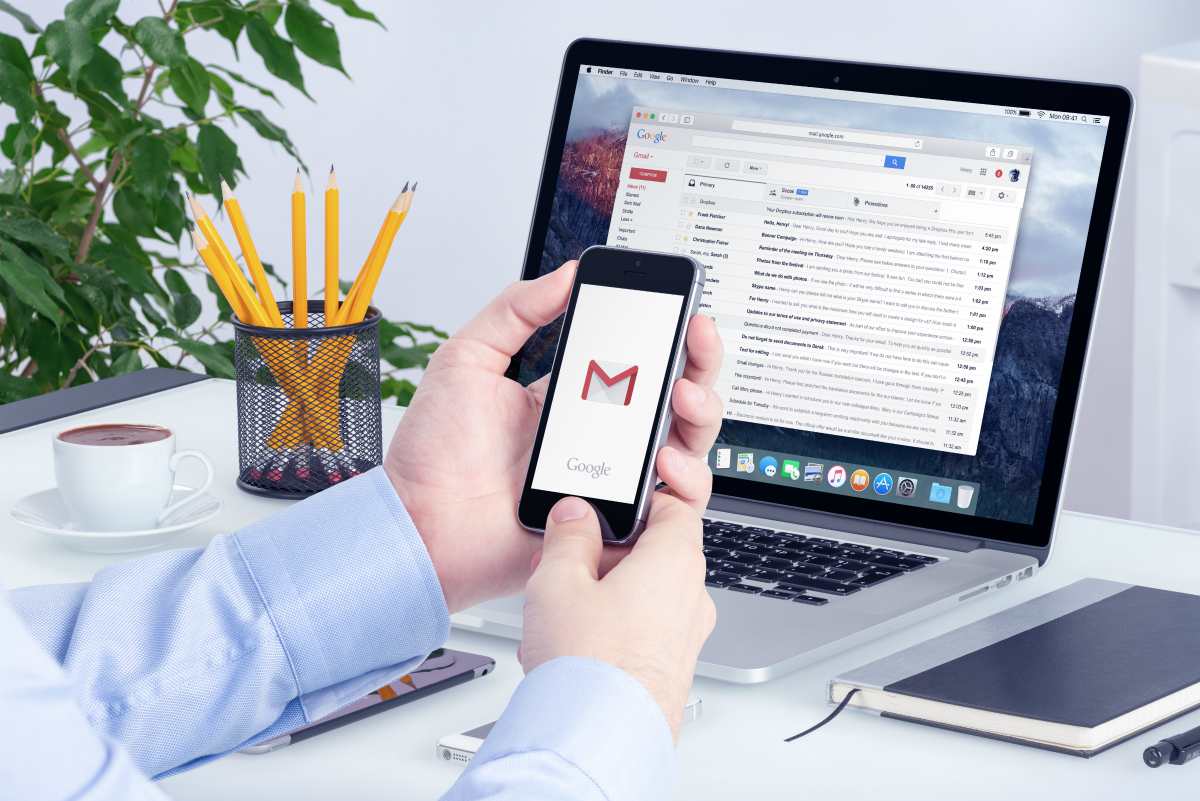 person using gmail on phone and computer | Sign Up For Gmail | A Comprehensive New User Guide | sign up for Gmail | gmail new account