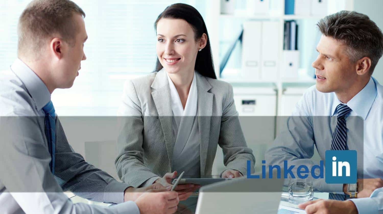 business people in a meeting | LinkedIn Sign In | Quick Tips To Improve Your LinkedIn Profile | LinkedIn Sign In | Featured