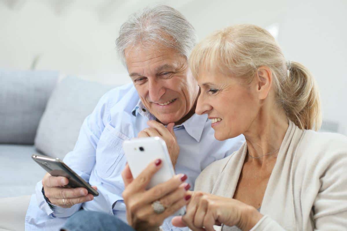 senior couple using smartphones | Sign Up For Gmail | A Comprehensive New User Guide | sign up for Gmail | email account