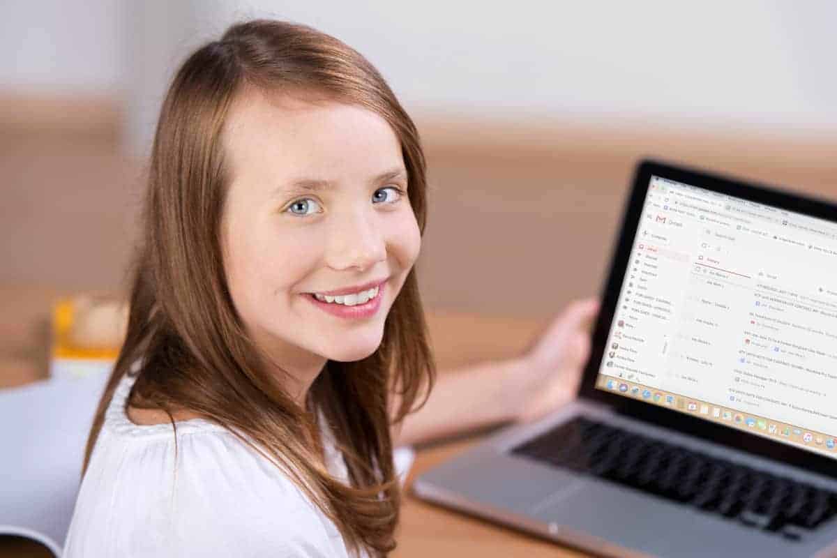 young student in front of her laptop | How To Make The Most Out Of Your Gmail Account