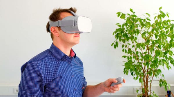 Featured | Man wearing VR glasses | What Is VR? How Virtual Reality Will Change The Future | virtual reality headset | playstation vr headset | virtual reality experience