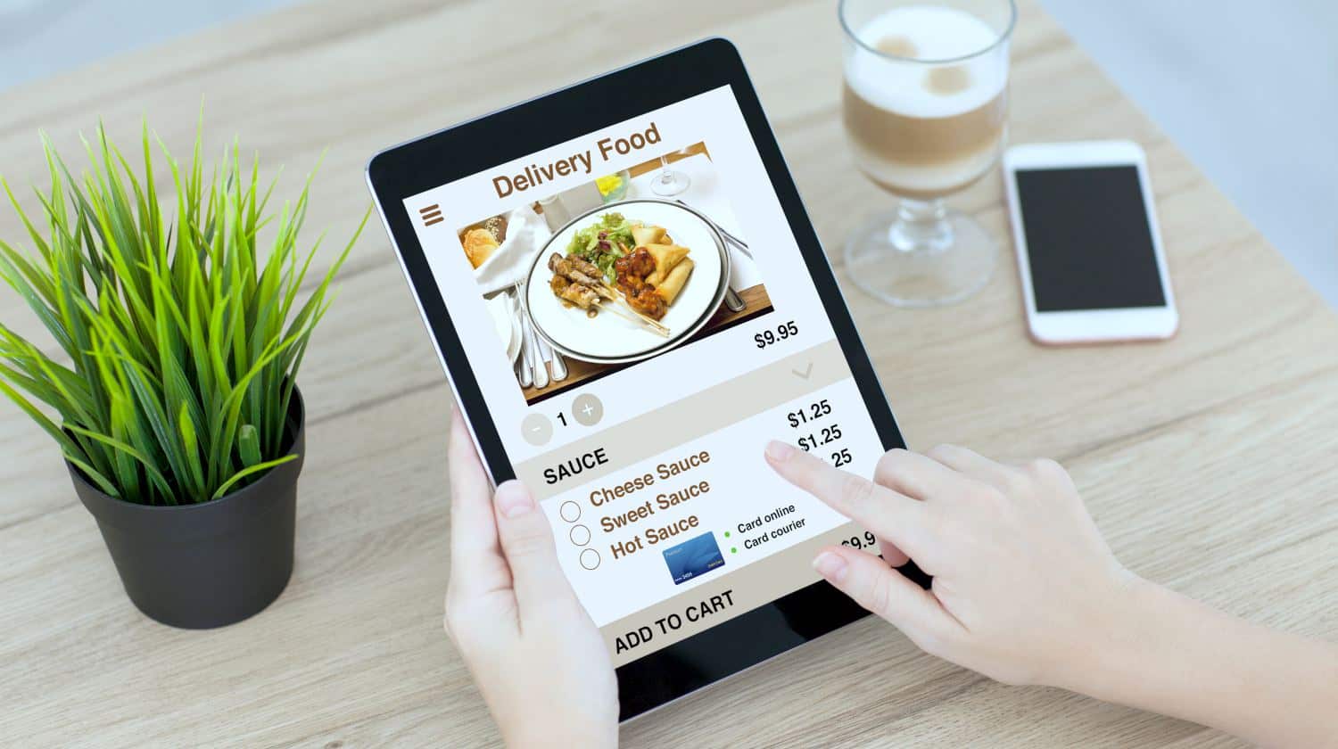 Feature | woman hands holding tablet | FeatureBest Food Delivery Apps For iOS and Android | Seamless Food Delivery | online food delivery
