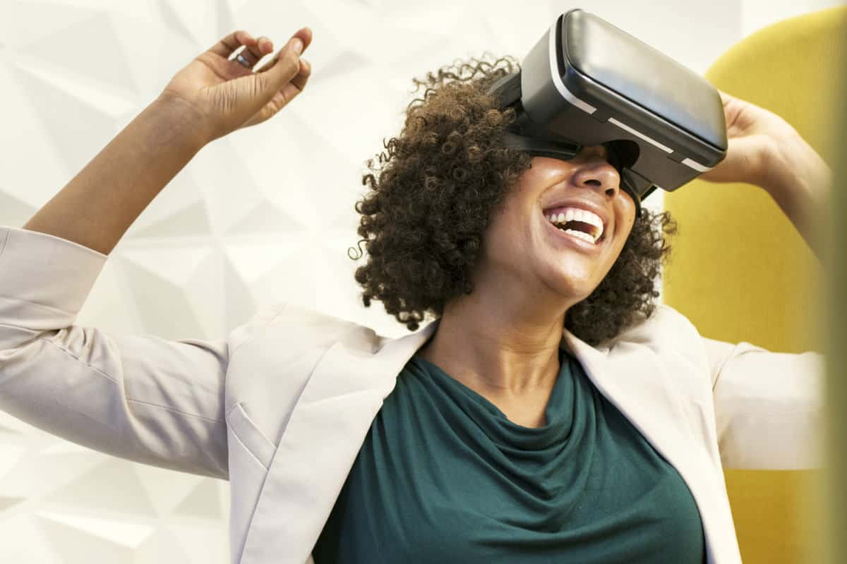 Woman using VR | AR vs VR: How Do Virtual And Augmented Reality Differ | What Is the Difference Between AR and VR? | augmented reality