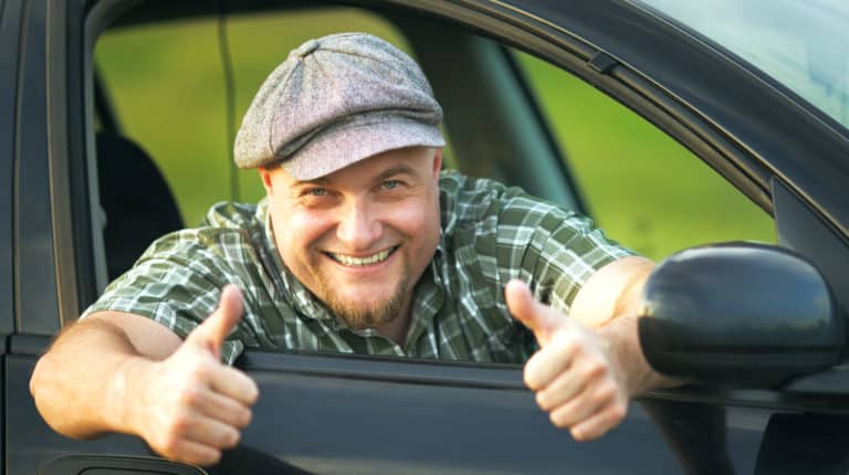 Feature | Happy driver shows that everything is fine | The Best Online Car Buying Sites and Apps