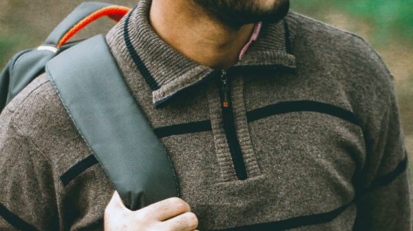 Feature | man wearing backpack | The Mancro Travel Charging Backpack | Amazon Finds