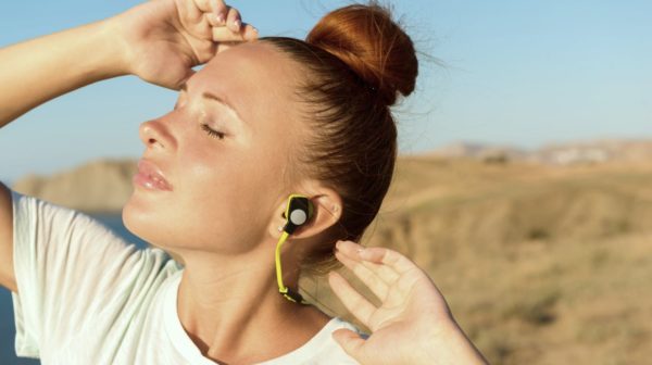 Feature | Woman listening music | Best Wireless Earbuds On Amazon