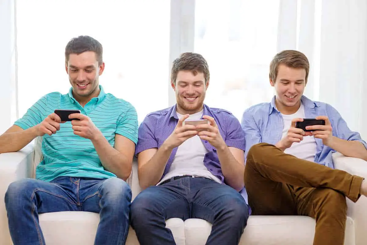 Friends playing multiplayer game with their mobile phones | There's An App For That | Phone Apps For Anything and Everything