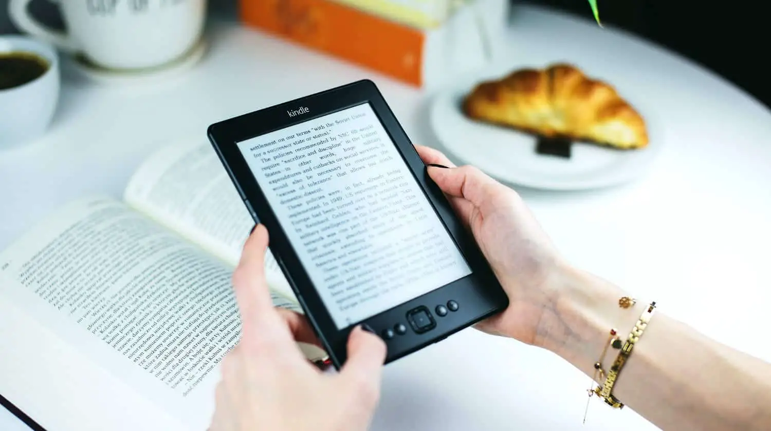 Feature | lady reading on kindle | Amazon's Best Selling Tech Kindle eBooks