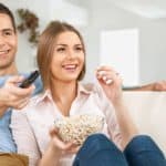 Feature | Couple watching a movie | Chromecast 2 vs Chromecast Ultra: What's The Difference?