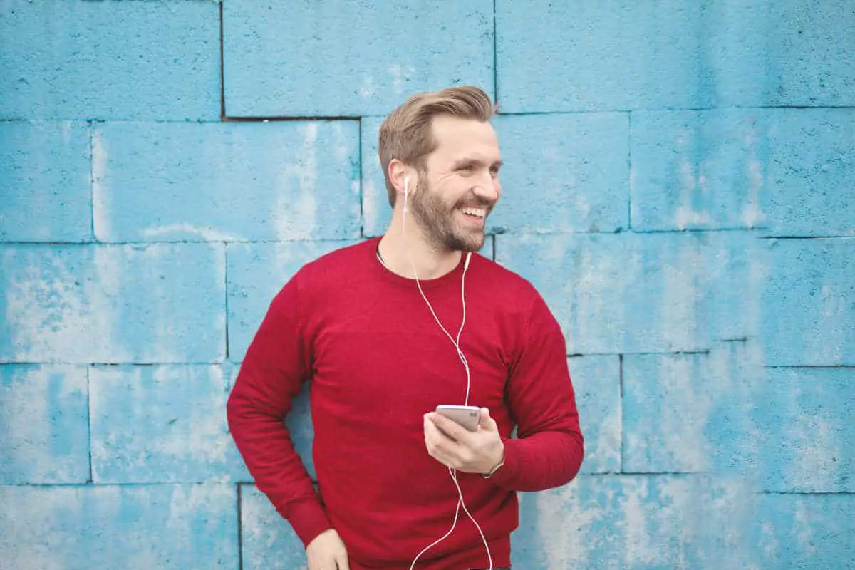Man listening to music | Don't Dump Your Old Phone: 15 Things You Can Do With Your Old Smartphone