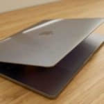MacBook Pro on table | MacBook Pro Touch Bar Unresponsive? This Is How You Can Fix It | macbook pro touch bar | macbook pro models | Featured