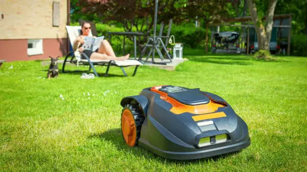 Automatic lawnmower in modern garden | Robotic Lawn Mowers and Other Smart Gadgets for the (Hard) Yard Work | best lawn mower | Featured