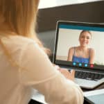 Two young women chatting online by making video call | How To Video Chat Using These Best Tools | Featured