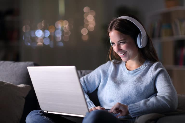 Woman listening on headphones