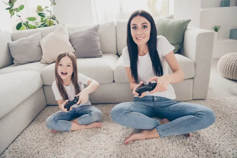 Mom and daughter playing video games
