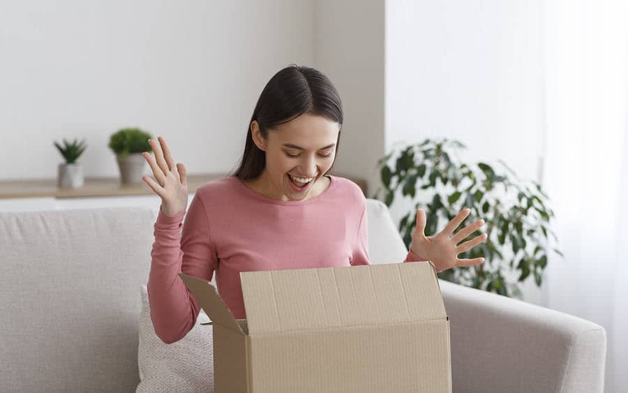 Woman opening Cratejoy subscription box